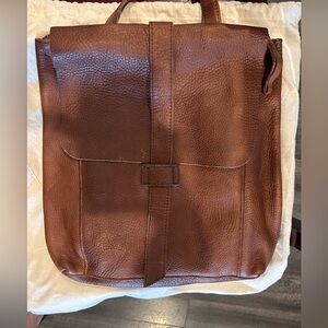 Duluth trading company leather convertible crossbody/backpack with pockets